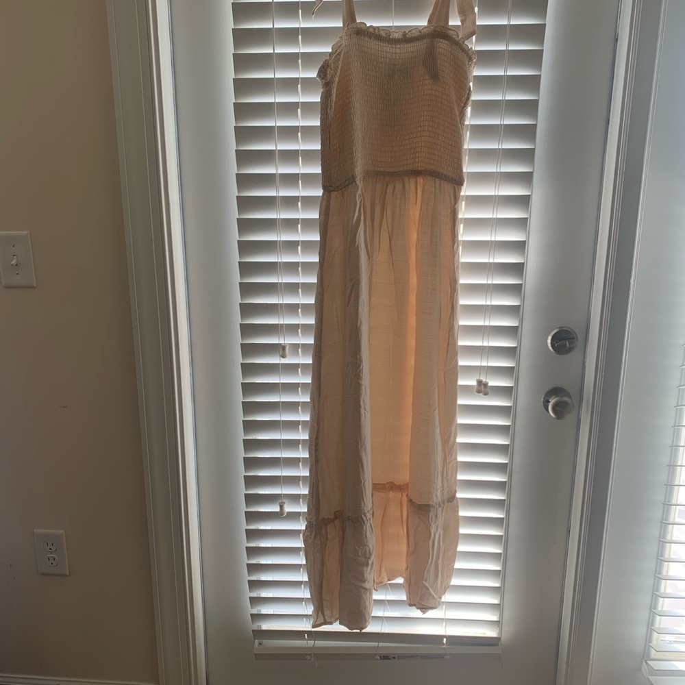 Large apricot colored midi dress